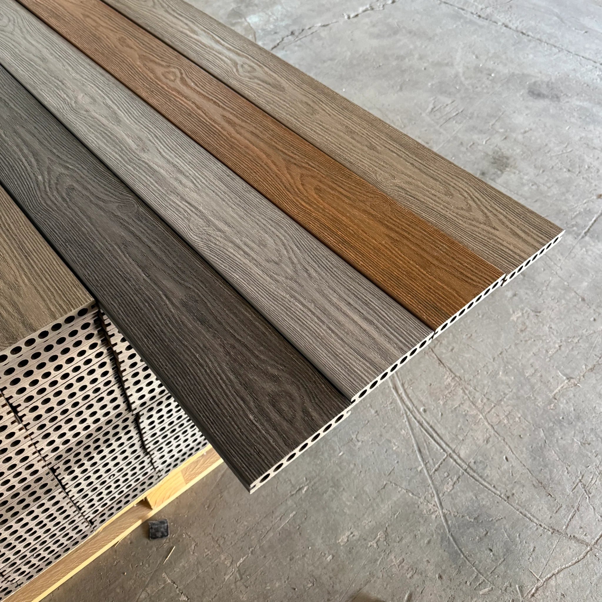 Premium Dual-Capped Composite Decking Range lined up 4 boards side by side