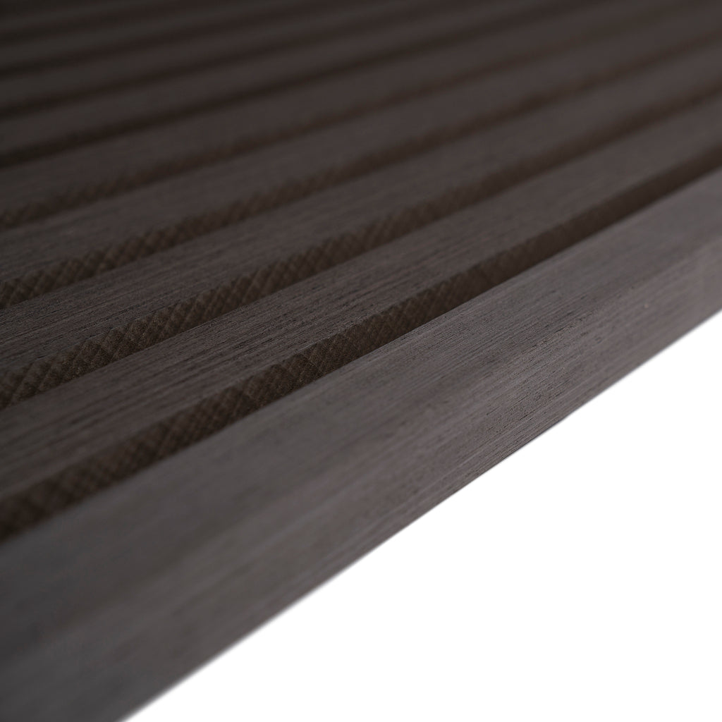 Close-up of a textured black surface with horizontal lines