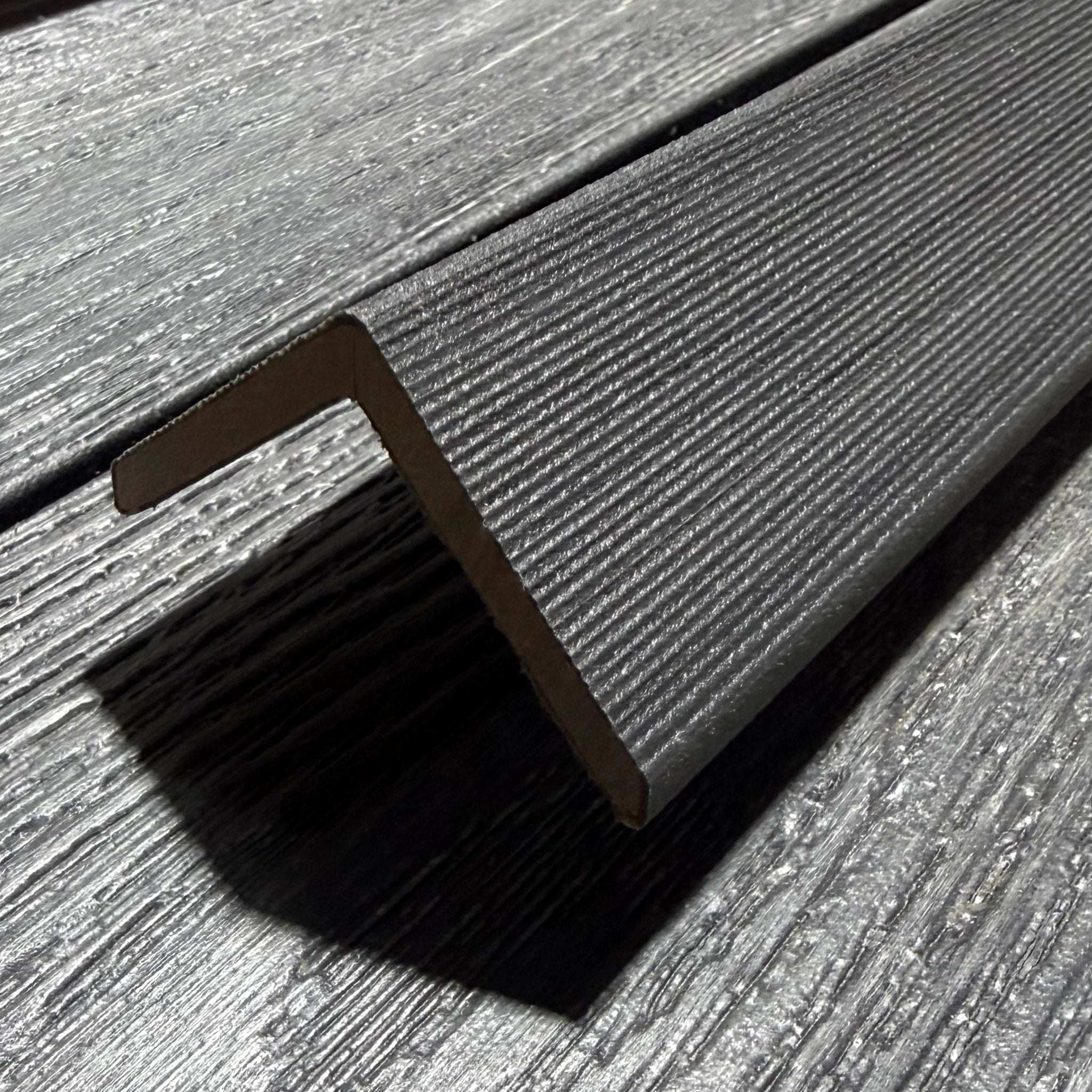 charcoal premium dual capped composite trim close up