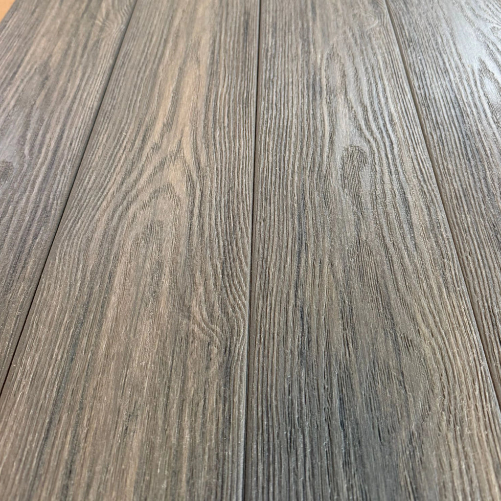 premium dual capped jade composite decking boards close up