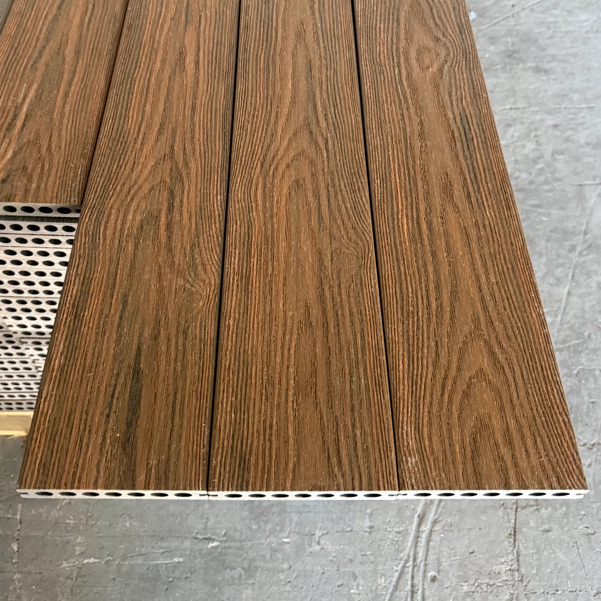 premium Dual-Capped Composite Decking Board – Elm row of three boards side by side
