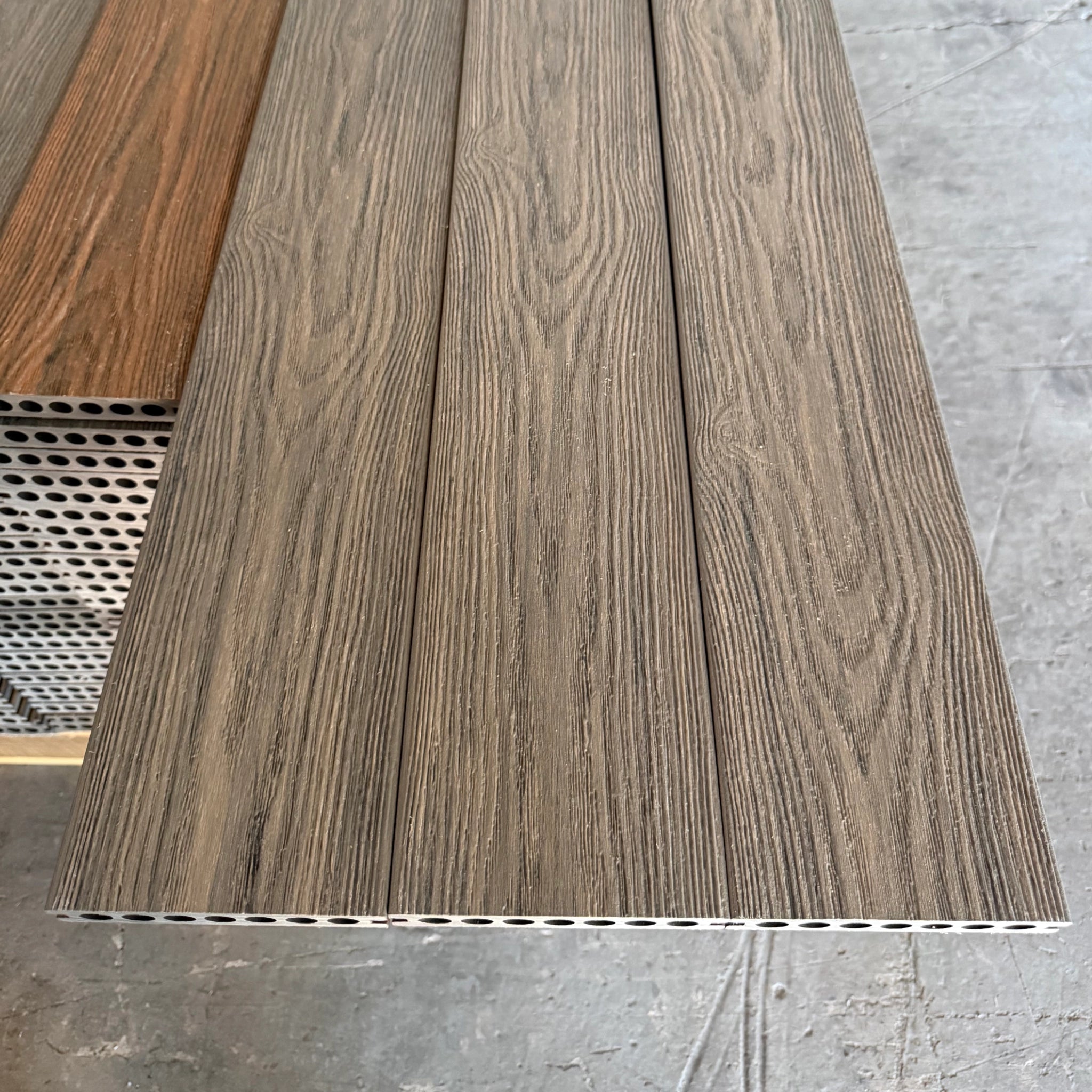 premium Dual-Capped Composite Decking Board – jade row of the boards, side by side