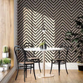Oak Herringbone Acoustic Wall Panel with table chairs and plants