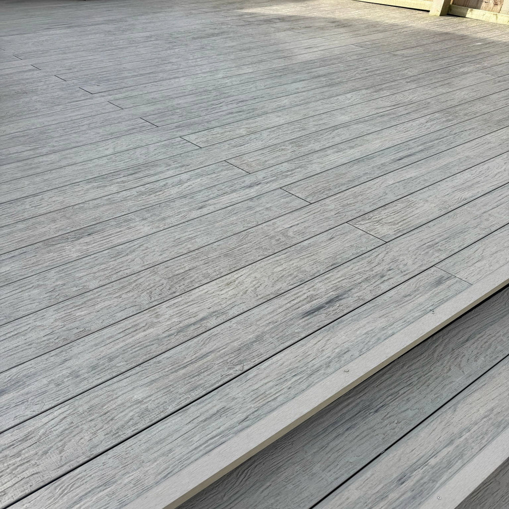 grey driftwood composite deck with horizontal planks