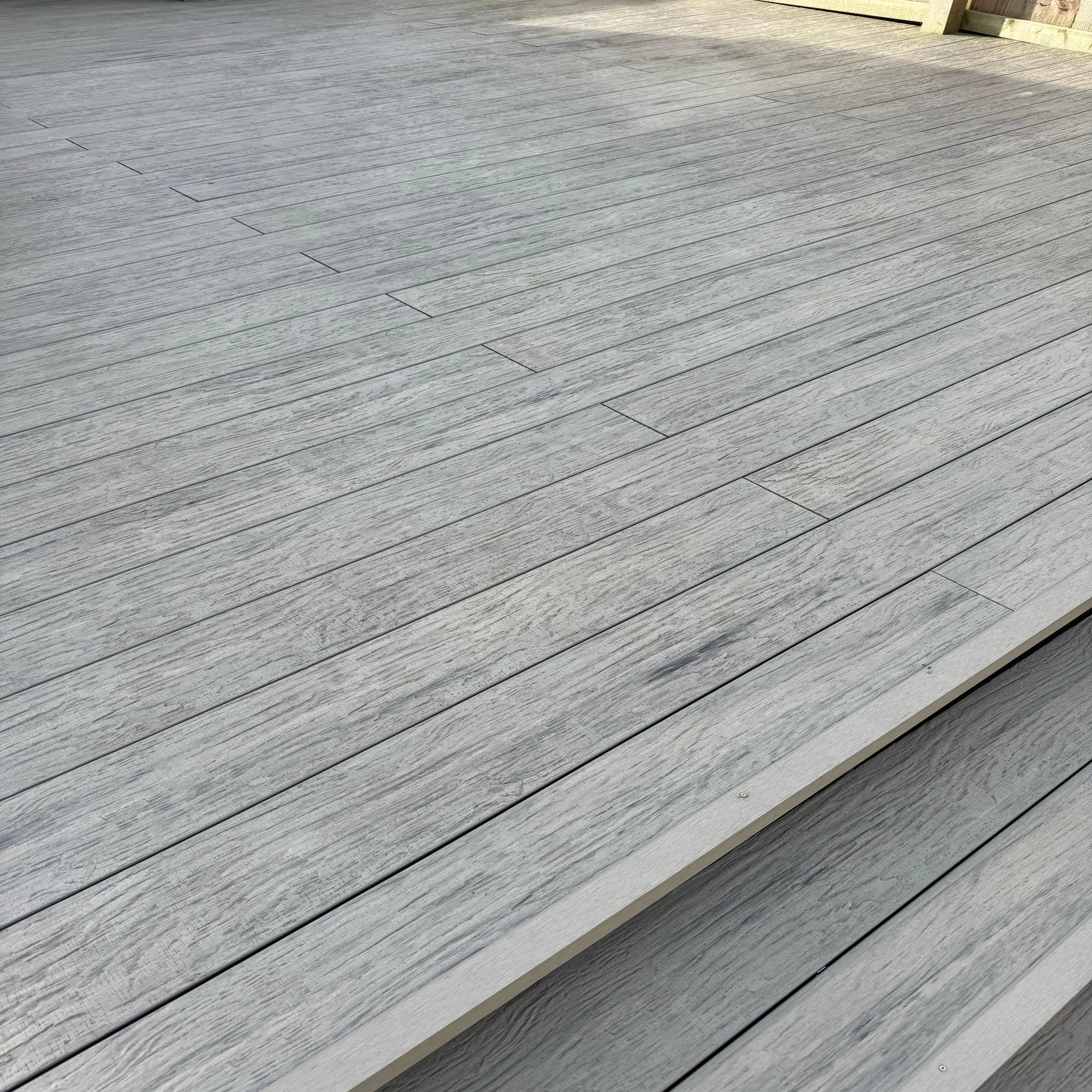 grey driftwood composite deck with horizontal planks