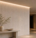Modern interior with flexistone off white line stone wall, table, and vase.